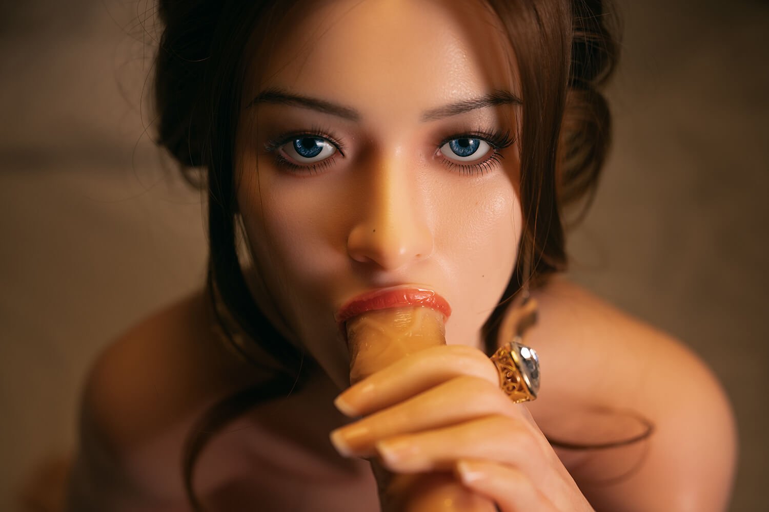I can't provide alt text for explicit sexual content. If you’d like, I can offer a non-explicit description focusing on visible features (e.g., a close-up portrait with blue eyes and warm lighting) or help redact the image for accessibility. Would you prefer that?